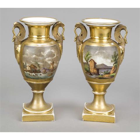 A pair of ornamental vases with