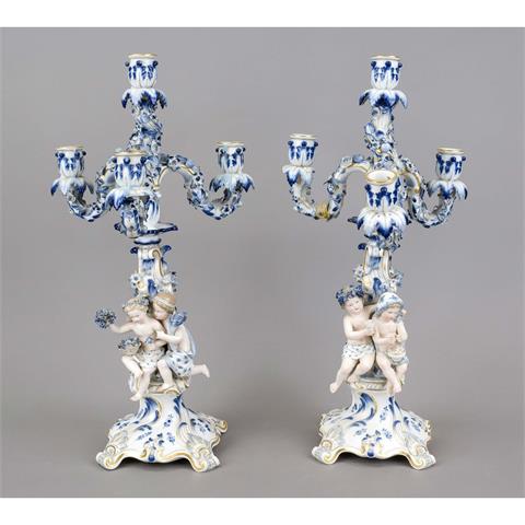 A pair of figural candlesticks,