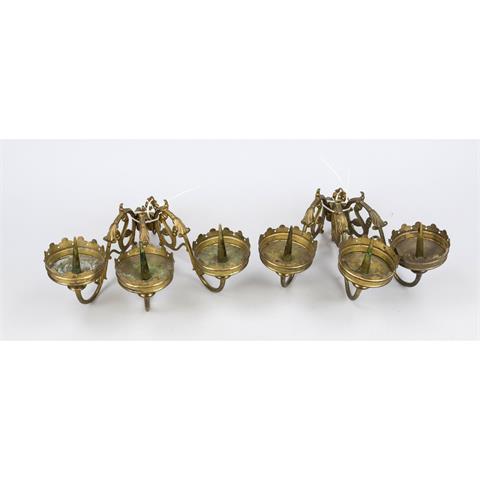 2 sconces, each with 3 flames,