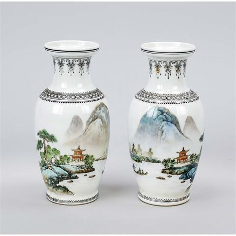 A pair of small vases with land